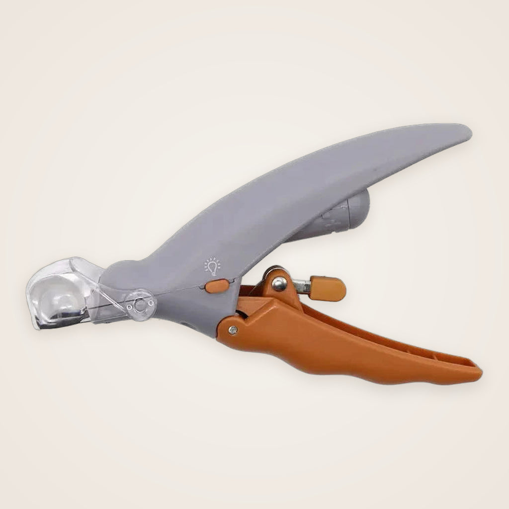 Pet nail clipper with built-in LED light, gray body and orange handle