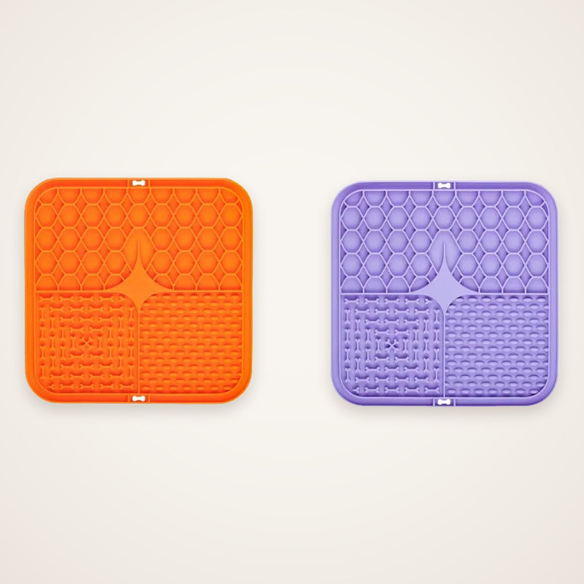 Two Snifflebay silicone dog lick mats, orange and purple