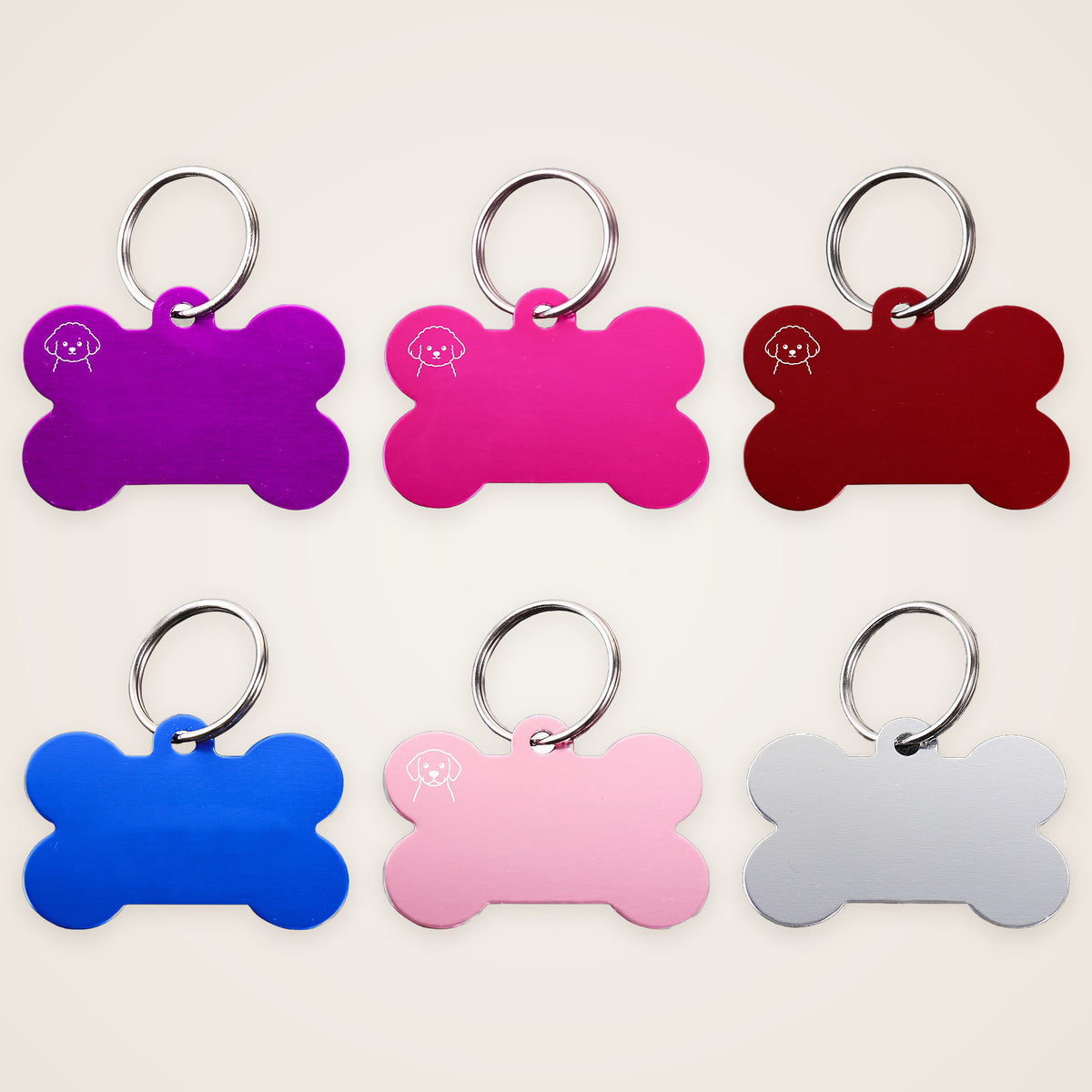 Six bone-shaped dog ID tags in different colors